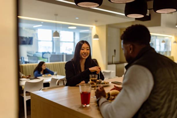 istock Casual Office Lunch Meeting 2194464076