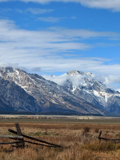 istock Snowy Tetons and Broken Fence 2194470097