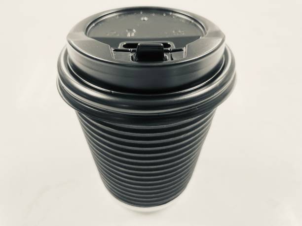 istock black paper cup of black coffee with a black plastic lid for take-away 2194474833
