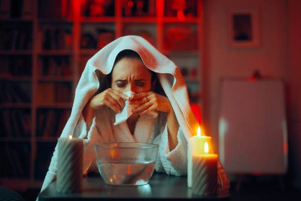 istock Sick Woman Does Steam Inhalations for Nasal Congestion 2194476145