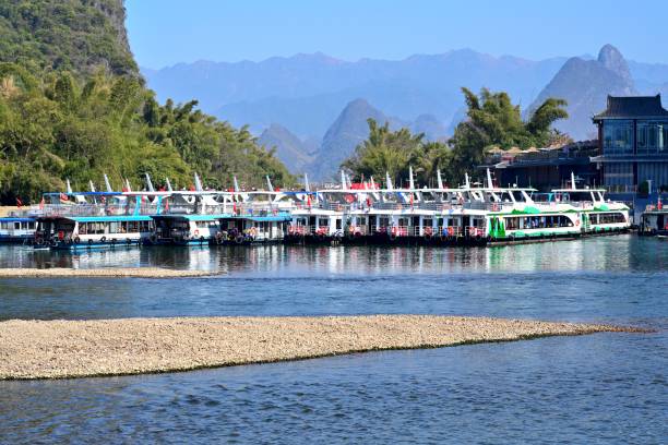 istock Famous pier and ferry in the karst area 2194478408