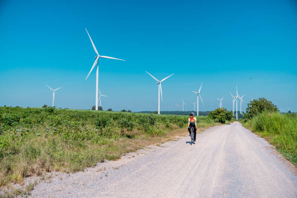 istock Cyclists on a countryside on windmills. 2194479306