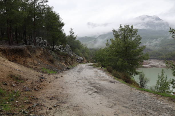 istock Road in winter in the mountains 2194482304