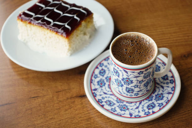 istock Experience the Joy of Coffee and Cake Delight Artfully Displayed on a Rustic Wooden Table 2194484750