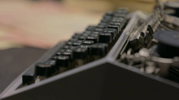 istock Close up of Fingers Typing on Typewriter in Office 2194489289