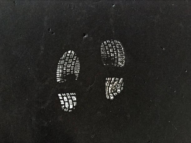 istock Background of a pair of standing footprints 2194490895