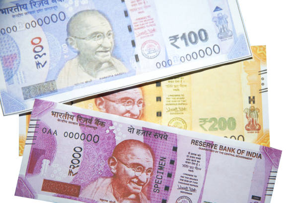 istock Indian currency bills close up shot with multiple banknotes top view, business concept backdrop. 2194499846