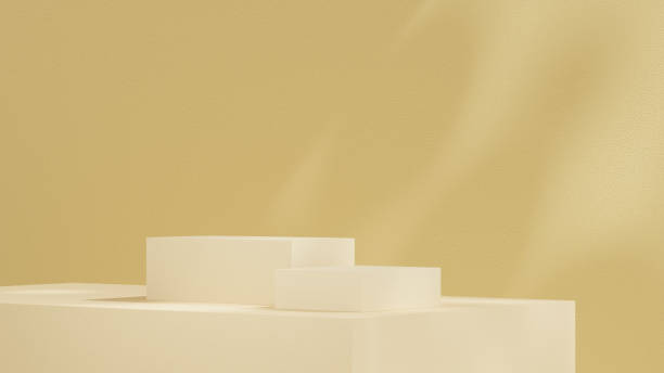 istock Product display stands, along with a podium, are set against a yellow background with soft, subtle shadows in a landscape orientation. 2194503589