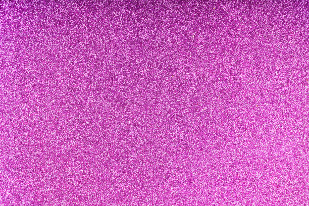 istock Purple Glitter Texture Background with Sparkling Particles and Reflections 2194509972