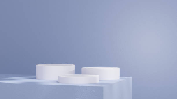 istock Product display stands, along with a podium, are set against a blue background with soft, subtle shadows in a landscape orientation. 2194512244