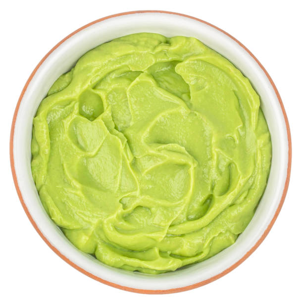 istock Bowl with guacamole avocado cream pure isolated on white background. top view 2194514190