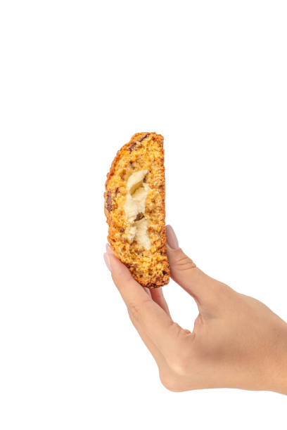 Oatmeal cookies in hand isolated on white background