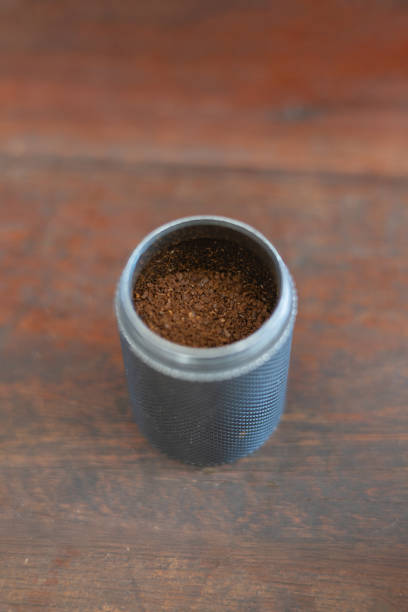Process drip coffee, Barista start chose coffee bean and Roasting. Barista making drip coffee by pouring spills hot water on coffee ground with prepare filter from copper pot to glass transparent drip