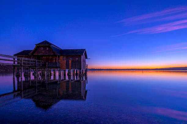 istock Boathouse at twilight on Ammersee, Bavaria, Germany 2194517736