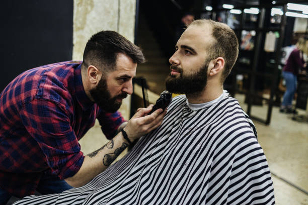 istock Man at hair salon 2194519436