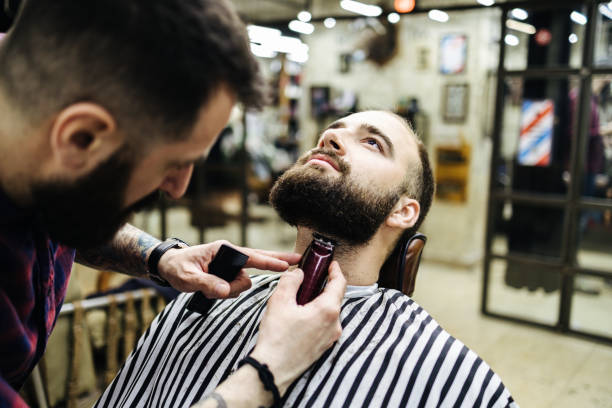 istock Man at hair salon 2194519489