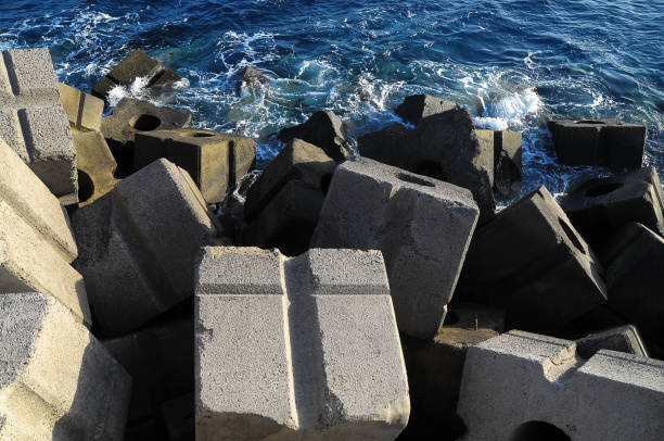 istock Cubes of Cement Breakwater 2194520716