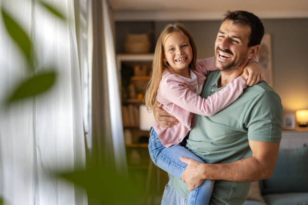 istock Father and Daughter Sharing a Fun and Playful Moment 2194522240