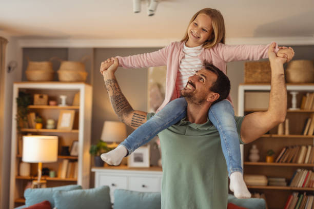 istock Father and Daughter Sharing a Fun and Playful Moment 2194522247