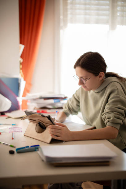 istock Young woman working from home 2194522809