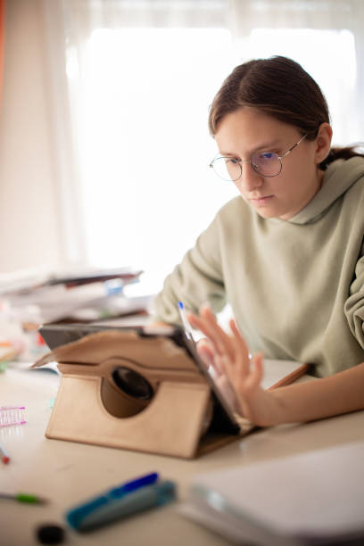istock Young woman working from home 2194523032