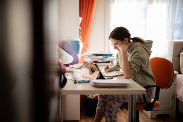 istock Young woman working from home 2194523824