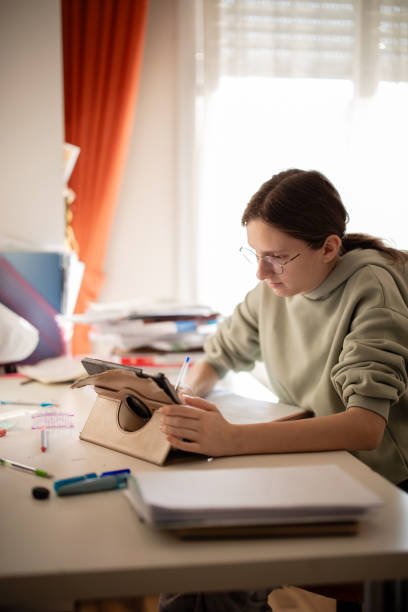 istock Young woman working from home 2194524308