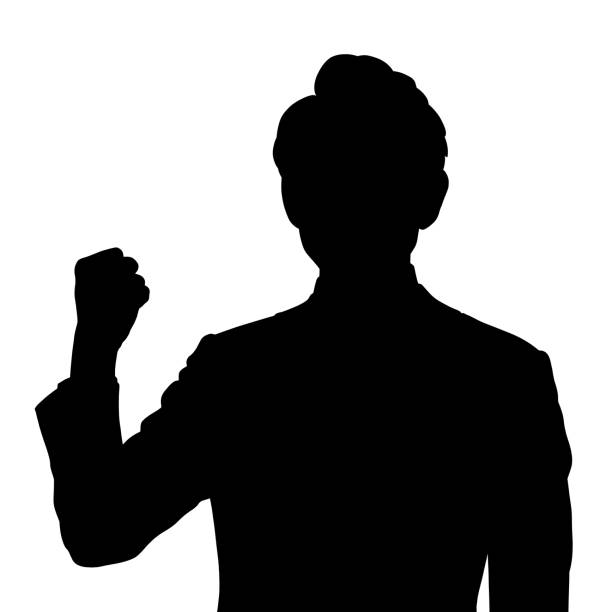 istock Silhouette of a man doing a fist pump. 2194526206