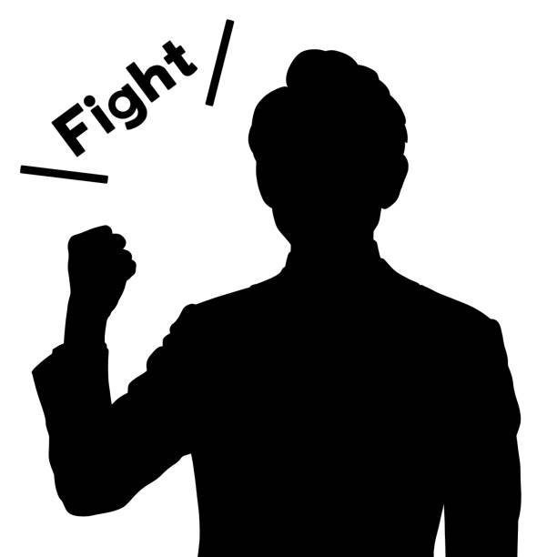 istock Silhouette of a man doing a fist pump. 2194526235