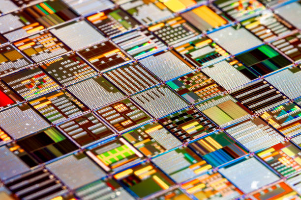 istock Silicon semiconductor wafer close-up. In electronics, a wafer also called a slice or substrate is a thin slice of semiconductor, a crystalline silicon, used for the fabrication of integrated circuits 2194529726