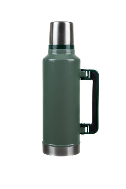 istock A green thermos with a stainless steel cap and bottom, black handle on the side, isolated on a white background, suitable for outdoor activities, camping, or travel. 2194529789