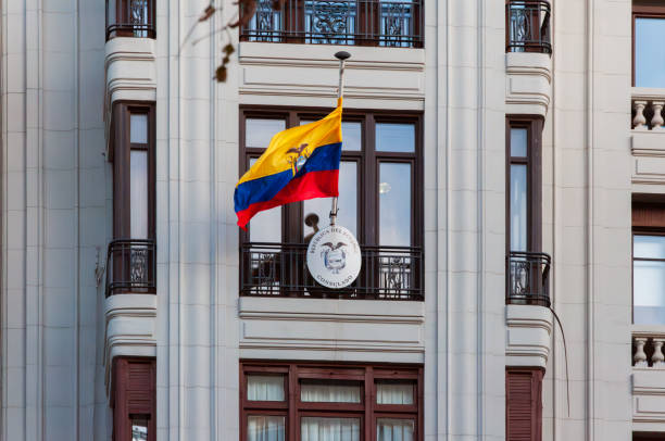 istock Ecuadorian flag waving atop consulate building, representing national presence, highlighting diplomatic relations and cultural representation in metropolitan urban setting 2194537014