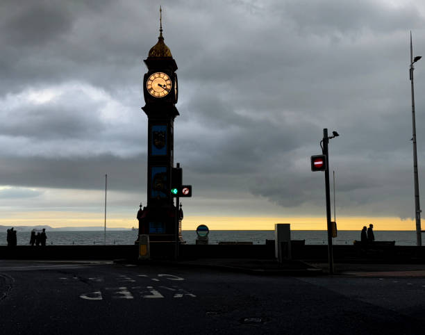istock Clock tower at dusk on the promenade 2194537897