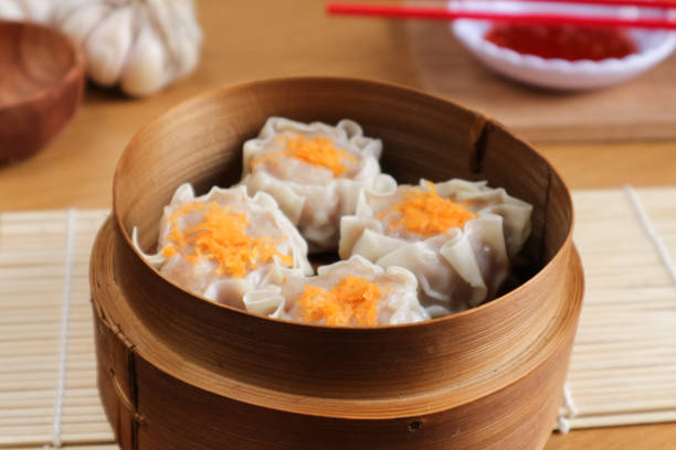 istock Steamed Siu Mai in a Bamboo Steamer 2194538102