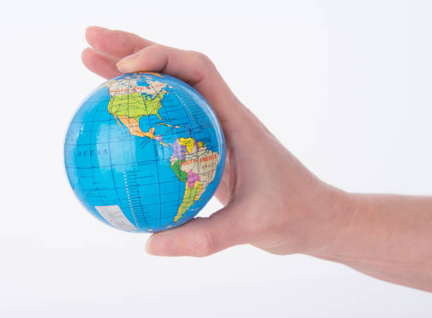Mini World Globe The world globe at your childs fingertips finger spinning globe stock pictures, royalty-free photos & images