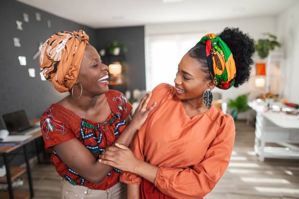 istock Two smiling designers sharing a moment of joy in their creative workspace 2194541727