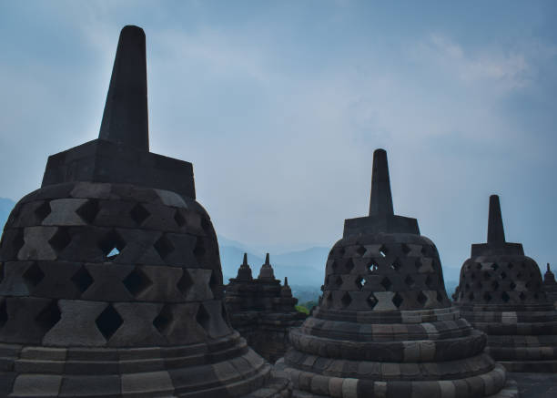 Borobudur is a 9th-century Mahayana Buddhist temple located in Magelang, Central Java, Indonesia. The temple is renowned for its impressive architecture, intricate carvings, and symbolic design, reflecting a combination of artistic and religious elements.