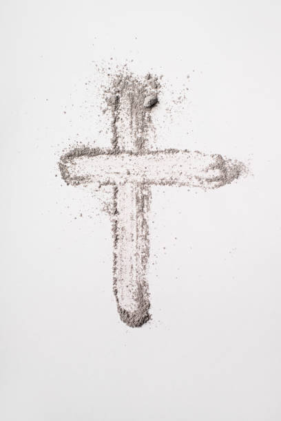 Ash cross symbol on white background for lent and religious reflection. Ash Wednesday.