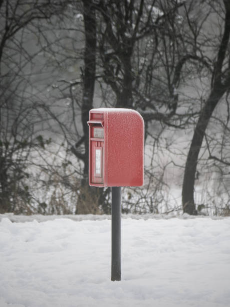 istock A frosty small post box on a cold winters day 2194544375