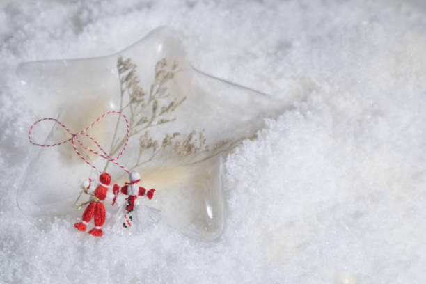 istock Martenitsa, Martisor, on the snow with copy space 2194547887
