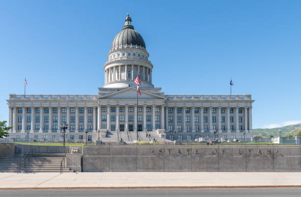 Salt Lake City, Utah, USA - June 6 2024. The Utah State Capitol Building and front lawn on a clear sunny day.