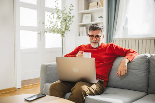 istock Mature man working from home 2194557380