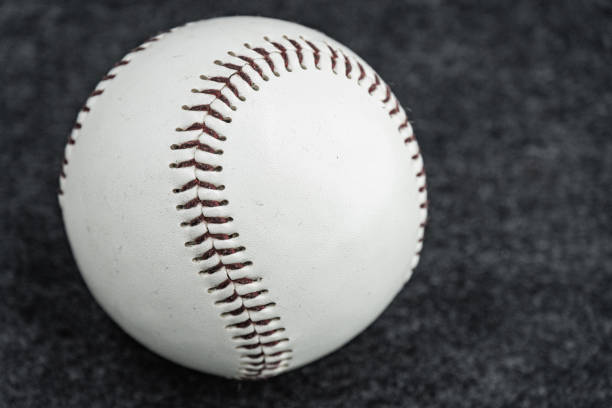 istock baseball on a gray background. baseball game 2194559765
