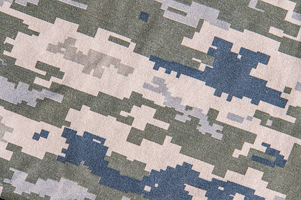This high-quality image showcases a seamless camouflage pattern inspired by military designs. Featuring a mix of earth tones, dark greens, and muted grays, this realistic pattern is perfect for outdoo