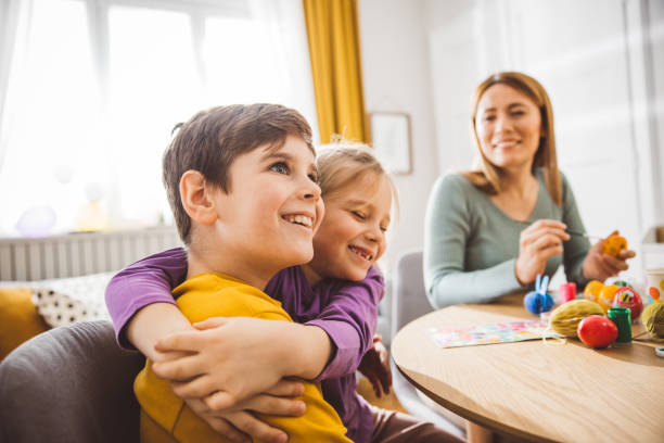 istock Happy family preparing Easter at home 2194561410
