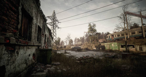 istock Abandoned Area with Overgrown Grass, Power Lines, and Derelict Architecture 2194565941