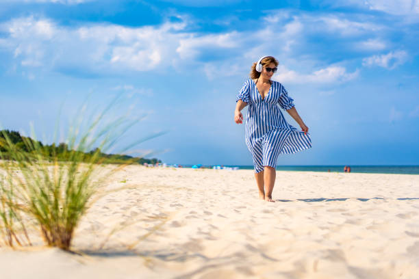 the traveler strolls along the beaches near the sea in the mountains waves landscape summer. High quality photo