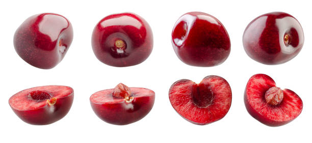 istock Set of whole and halves cherry berries isolated on white 2194567067