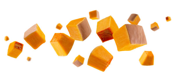 istock Pumpkin pieces flying and levitating in space. Volumetric backlight. Isolated on white 2194567068