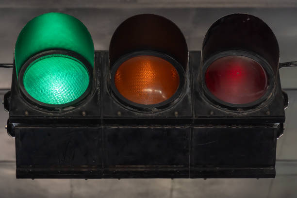 istock Horizontal vintage traffic light close-up. Metallic old-fashioned stoplight. 2194568446